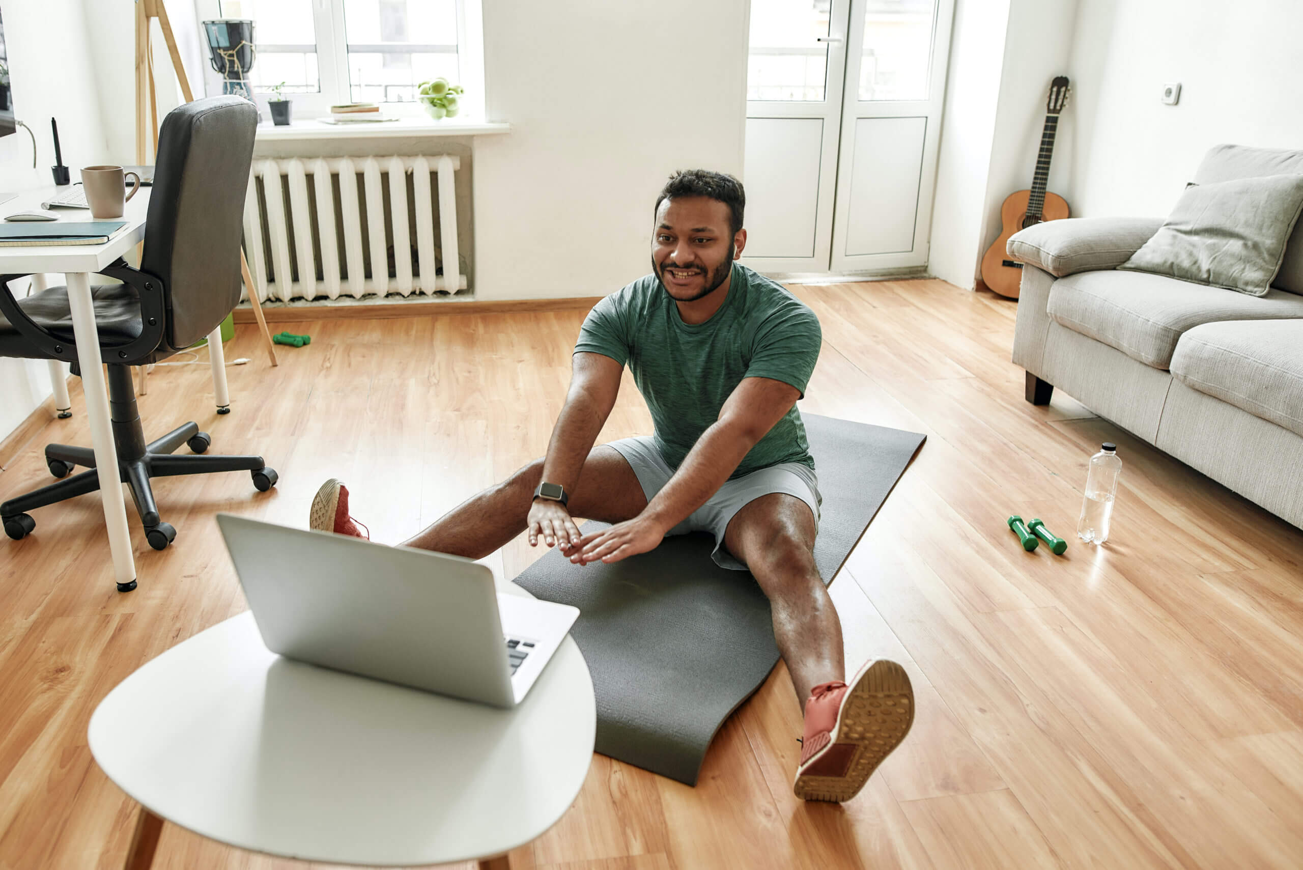 Cheerful stretching. Male fitness